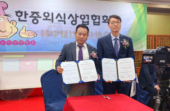 ���в�����ҵЭ�����׶��������˽ִ�Ƶ���д������